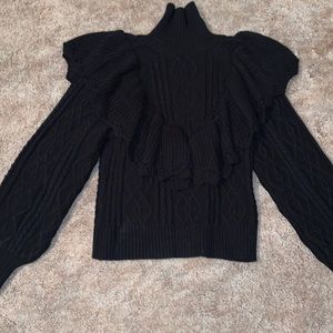 Black turtle neck sweater